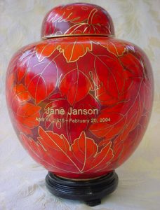 red and gold cremation urn for ashes