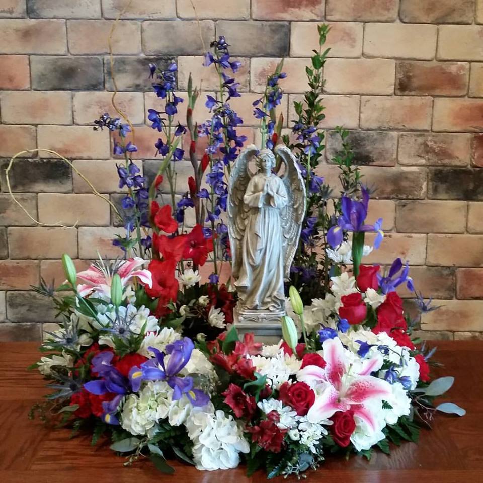 angel funeral flower arrangement