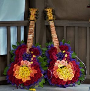 creative funeral flowers Gregg Allman guitars