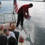 scattering ashes ceramony boat water