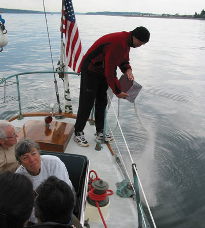 scattering ashes ceramony boat water