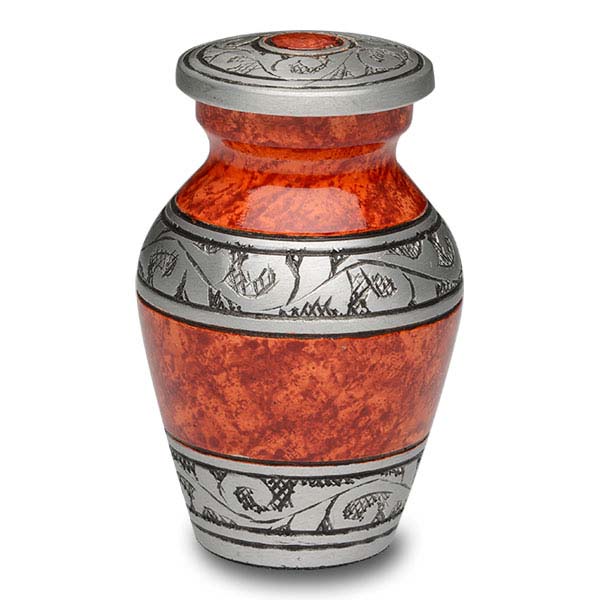 small orange urn for ashes